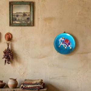 Handcrafted blue pottery plates with traditional Jaipur design